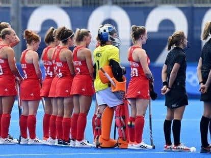 Maddie Hinch (in yellow) lines up for Great Britian women's hockey team against India. Picture courtesy of England Hockey