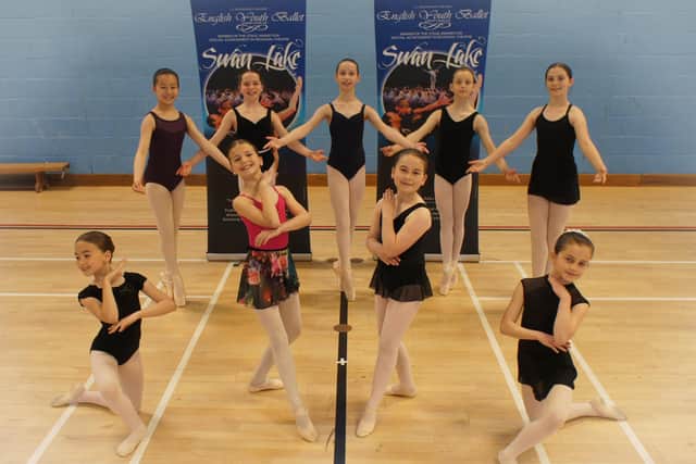 Mirabelle Hogan, nine, from Burgess Hill (bottom left) with some of the other dancers who will perform in the  English Youth Ballet’s (EYB’s) Swan Lake SUS-210728-144700001