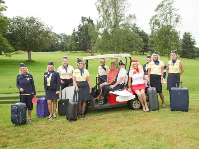 The golfers - or are they flight attendants? - gather for the lady captain's day