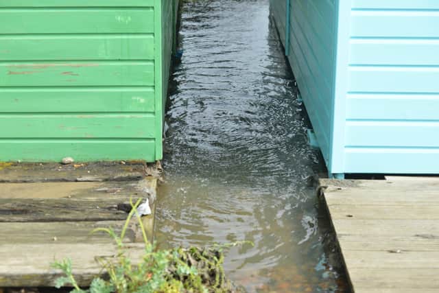Burst sewage main down Cinque Ports Way, Bulverhythe Beach area, St Leonards. SUS-210730-104931001