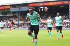 Percy Tau celebrates his excellent goal in a pre-season friendly victory at Luton Town