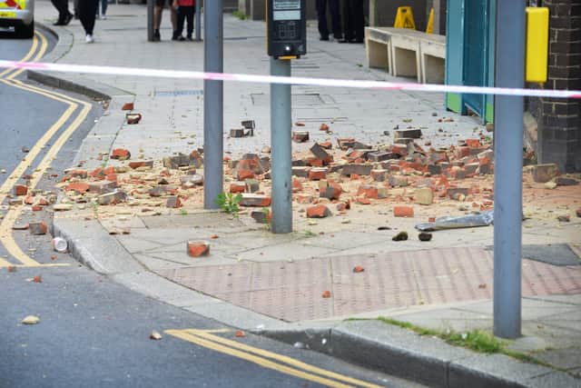 Loose bricks falling from the old Queensbury House building in Hastings. Pic Justin Lycett SUS-210308-150933001
