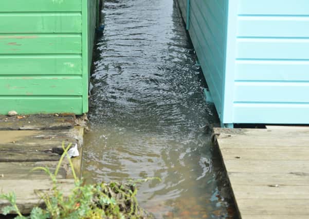 Burst sewage main down Cinque Ports Way, Bulverhythe Beach area, St Leonards. SUS-210730-104931001