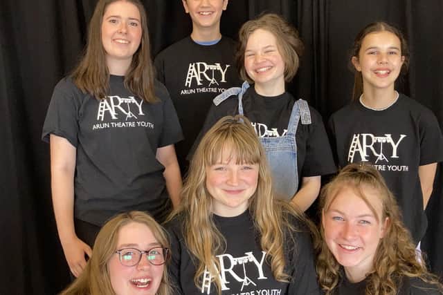 Hannah Thomas (front row, centre) with her fellow Arty members
