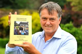 Dr Tim Fooks, former High Sheriff of West Sussex, with his book, WEST SUSSEX IN THE COVID-19 PANDEMIC – A year like no other. Picture: Steve Robards SR2108063