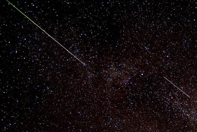 A meteor shower captured on camera - Picture by Peter Cripps