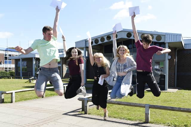 Jumping for joy on results day.  Picture: Liz Pearce  LP191032