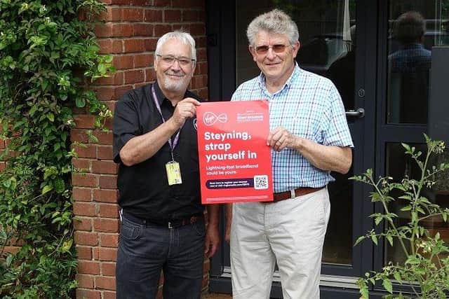 Ed Wicks from Virgin Media on the doorstep with local resident Rick Knowles who has signed up for gigabit broadband in Steyning.