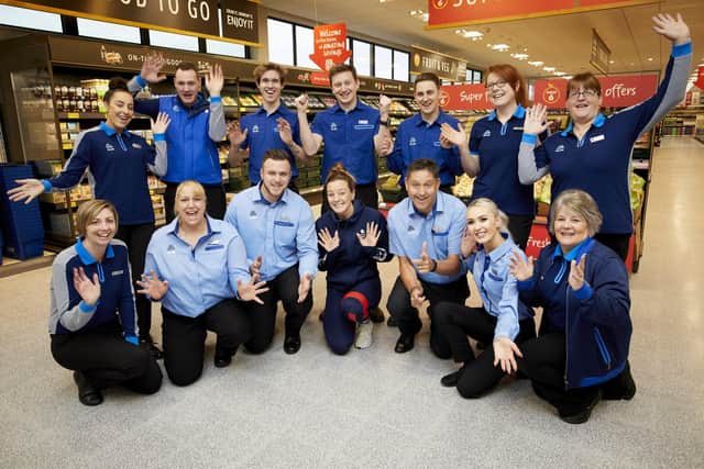 Manager Arron Barley and Team GB cyclist Katy Marchant help with the grand opening of ALDI Armthorpe. Photo: Mark Waugh  

Pictured Arron and his team