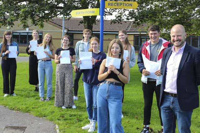 Students at The Littlehampton Academy celebrate their A-level results.