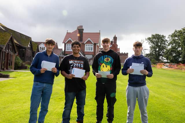 Bede’s 2021 leavers celebrating their A Level results: L-R Monty Hadow, Tim Jain, Arlo Brown and Oscar Henderson SUS-211008-123212001