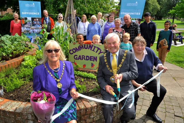 Mayor of Chichester John Hughes and his wife Cllr Cherry Hughes open new community garden at Swanfield Community Centre in Chichester. Pic S Robards SR2108091 SUS-210908-170427001