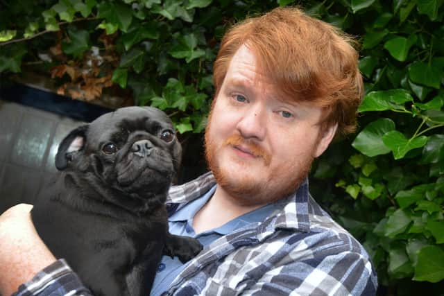 Kristian Rawlings with Dolly the pug, St Leonards. SUS-211108-092318001