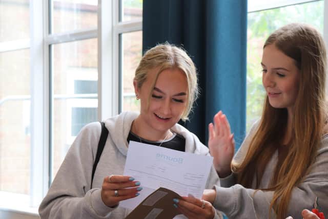 Students collect their GCSE results at Bourne Community College