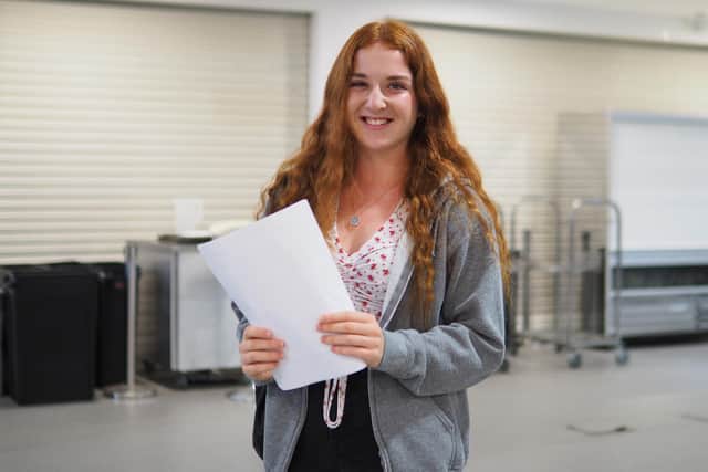 Lucie Steele collecting her results