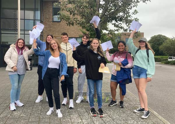 Students at the Sir Robert Woodard Academy celebrate their GCSE results.