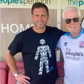 Crawley Town supporter Chris Russell (right), with Reds legend Dannie Bulman, will take part in a charity walk with Sky Sports presenter Jeff Stelling to raise funds and awareness for prostate cancer