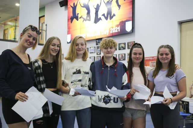 Hattie Priest, Sophie Hills, Bethany Wilson-Law, Elliott Wilson-Law, Jodie Willard, and Annie Cairns celebrating their GCSE results at The Littlehampton Academy