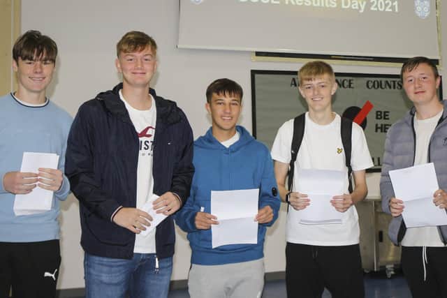 Harrison Lloyd, Ben Martin, Marko Karafilovski, Bayley Williams, and Rhys Elliott celebrating their GCSE results at The Littlehampton Academy