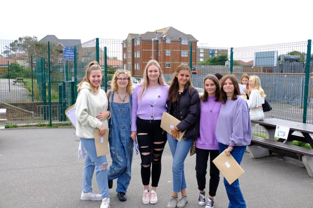 St Richard's Catholic College students with their GCSE results SUS-211208-125213001