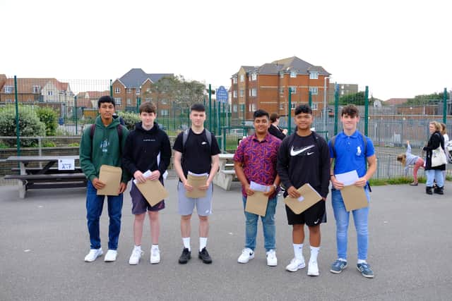St Richard's Catholic College students with their GCSE results SUS-211208-125226001