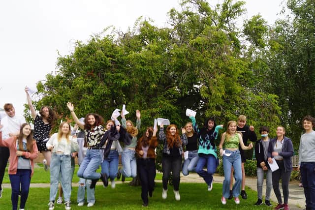 GCSE students leap for joy. Photo: Chichester High School