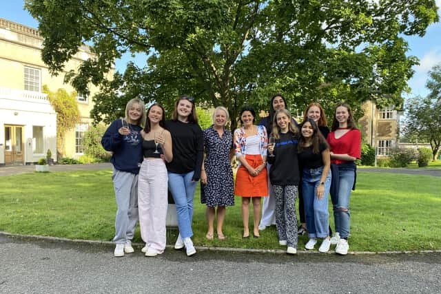 Photo: Farlington Year 13 students, together with Headmistress  Louise Higson and Head of Sixth Form  Claudine Maude, celebrate outstanding results on A-Level Results Day 2021
