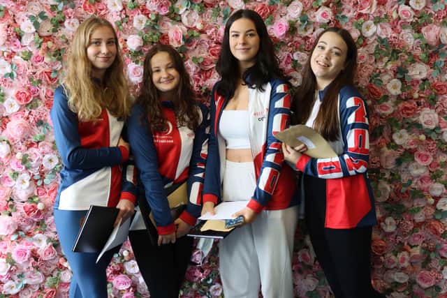 Millie Peebles, Ivy Mason, Connie Vincent, and Georgia Nicholaides, who are representing Team GB in the Dance World Cup, celebrating their GCSE results at Davison CE High School for Girls
