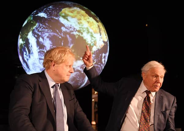 Sir David Attenborough and Prime minister Boris Johnson attend the launch of the UK-hosted COP26 UN Climate Summit, being held in partnership with Italy this autumn in Glasgow. (Photo by Jeremy Selwyn - WPA Pool/Getty Images) PPP-210617-165856006