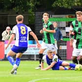 Action from last season's clash between Burgess Hill Town and Haywards Heath Town. Picture by Chris Neal