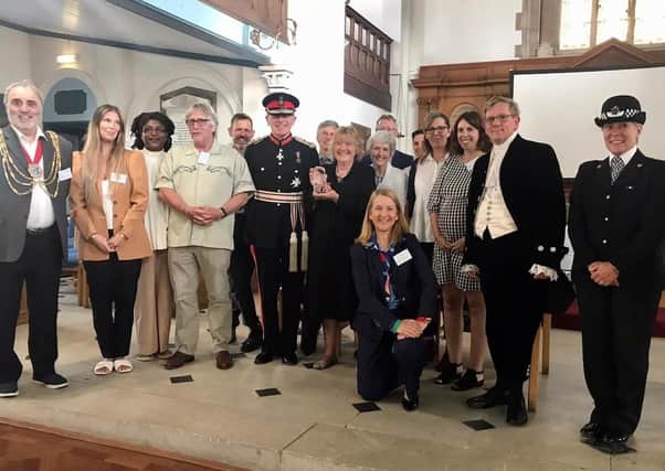 Members of charity Sussex Pathways presented with a Queen's Award for Voluntary Service