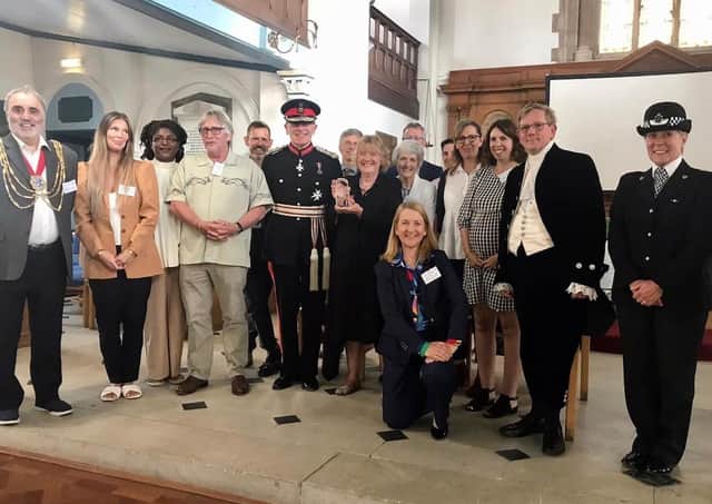 Members of charity Sussex Pathways presented with a Queen's Award for Voluntary Service