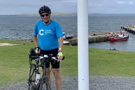 Peter West from Storrington - a former Horsham Police detective sergeant - has cycled from Land's End to John o'Groats for Cancer Research UK SUS-210818-144731001