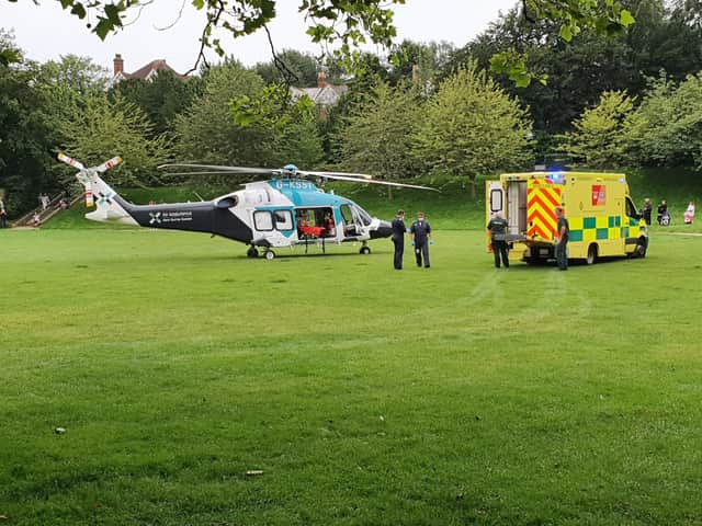 Paramedics and the air ambulance in Alexandra Park, Hastings SUS-210818-111348001