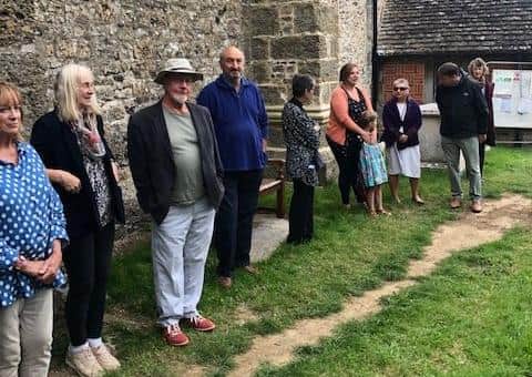 Some of those who attended a  poignant reburial service at St Mary's Church, Thakeham