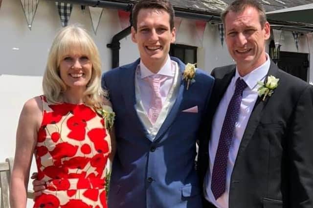 Cowfold dad Andy Fountain - who will be taking on six marathon challenged for Rockinghorse - with his son Eddie and wife Amanda SUS-210824-084938001