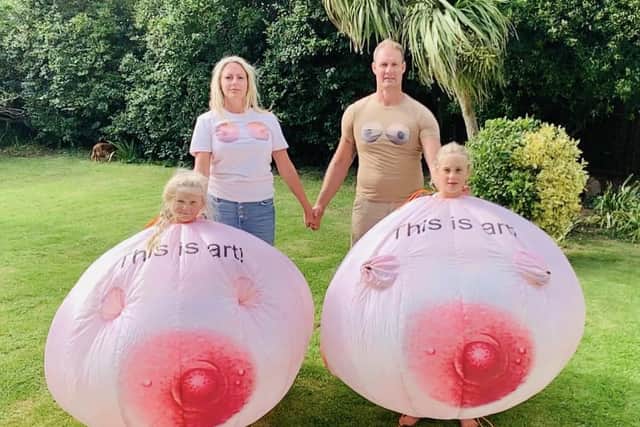 Kelly Forshaw Smith, her husband Paul Smith, and their children Aurora and Summer Smith, dressed up in inflatable boobs and wearing boob t-shirts to stand up to Facebook