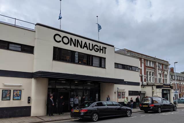 Staff at the Connaught Theatre in Worthing pay tribute to Sam McCarthy-Fox as his funeral cortege passes