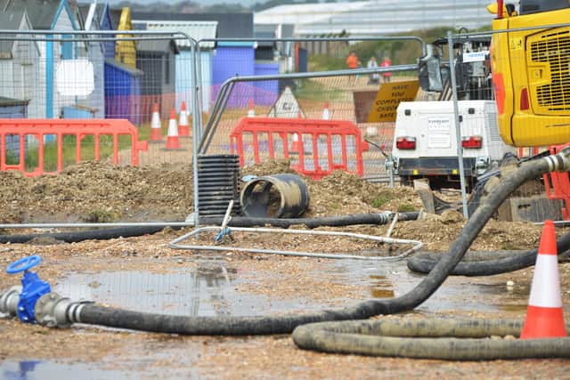 Burst sewage main down Cinque Ports Way, Bulverhythe Beach area, St Leonards. SUS-210730-104611001