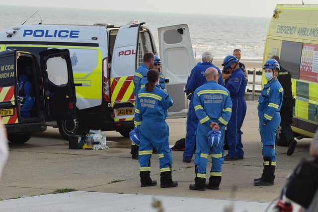 Emergency services at the scene where five people were rescued off Cooden Beach, near Bexhill after their dinghy capsized. Picture by Dan Jessup SUS-210822-080953001