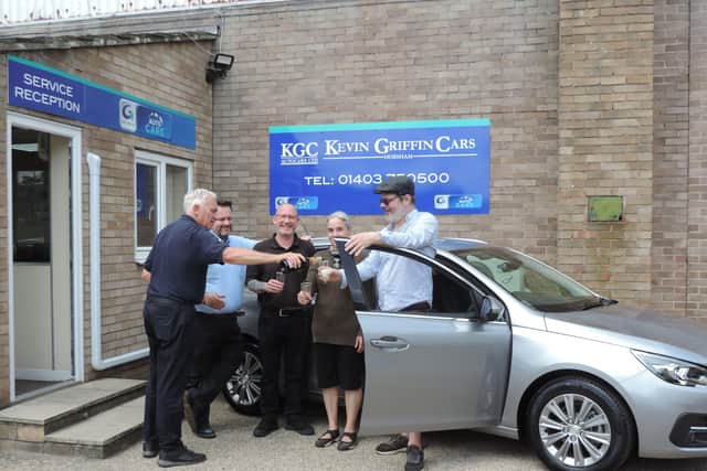 Kevin McDowell, right, won a Peugeot 308