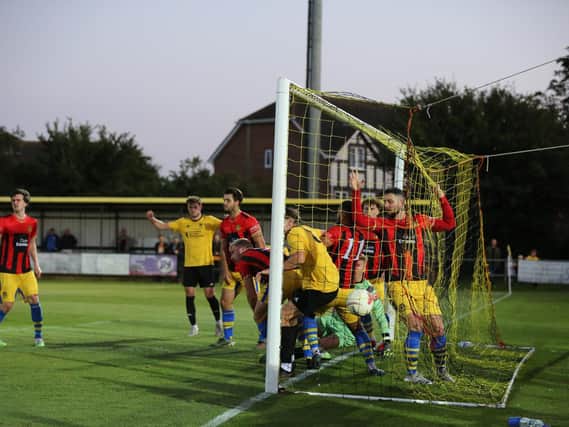 Littlehampton force the ball into the net on their way to beating Sittingbourne / Picture: Martin Denyer