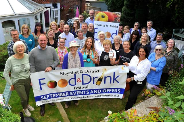 Reina Alston, director and vice-chair of Steyning & District Community Partnership, with businesses, sponsors and supporters of the Steyning Food and Drink Festival at the 2021 launch. Picture: Steve Robards SR2108264