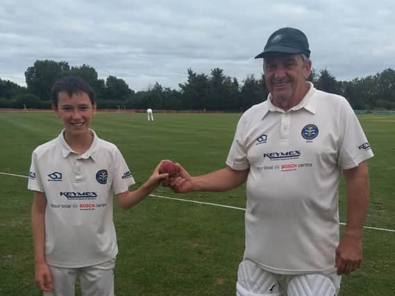 Under-13 Aidan Splading, who took 4-44 for Horley CC 2nd XI, with captain Darren Croft