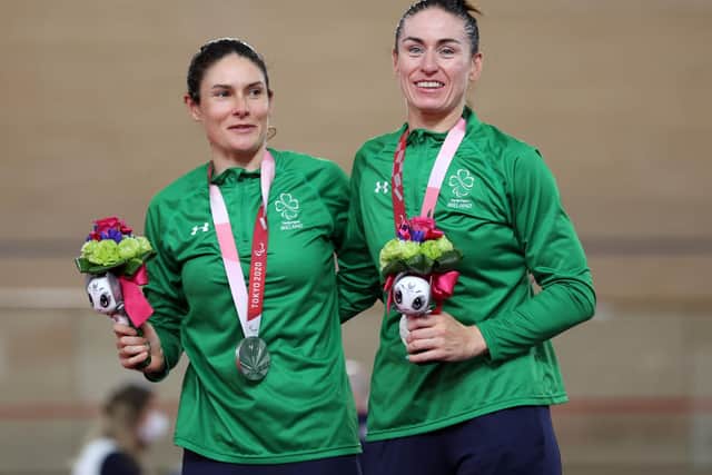 Katie-George Dunlevy (left) and Eve McCrystal, pictured receiving silver in the B 3,000m individual pursuit, won Paralympic gold in the women’s B time trial at the Fuji International Speedway in Tokyo this morning. Picture by Kiyoshi Ota/Getty Images