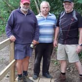 Horsham Town Community Partnership volunteers David Searle, Roland Knight and John Matthews have rebuilt a bridge on the 13-mile Riverside Walk route