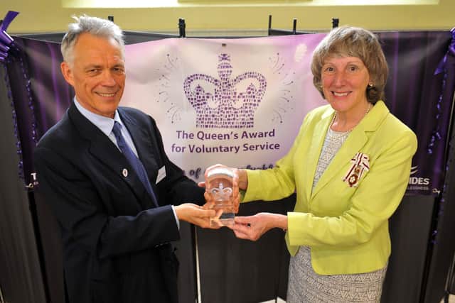 Mrs Susan Pyer, Lord Lieutenant of West Sussex, presents the Queen's Award for Voluntary Service to Turning Tides chief executive John Holmstrom. Picture: Steve Robards SR2109011