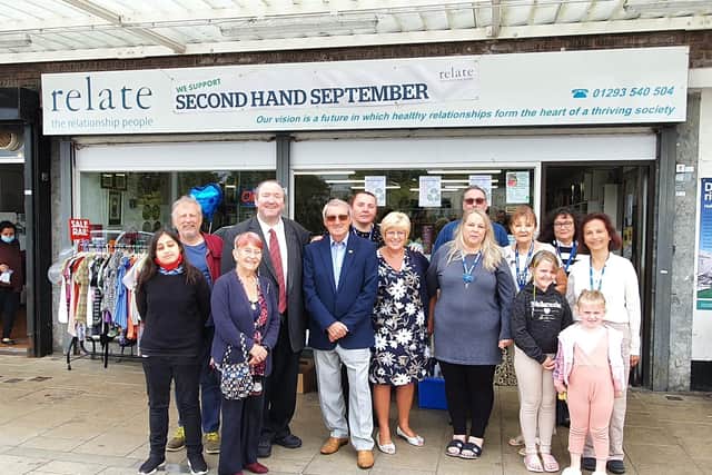 Cllr Michael Jones and store manager Cara outside the Broadfield Relate shop with others as Second Hand September is launched