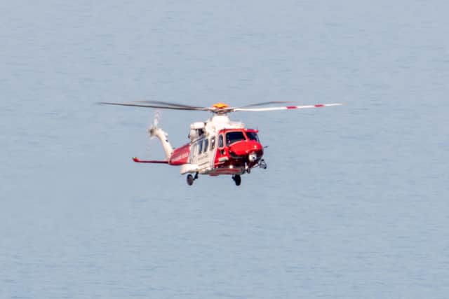 Coastguard helicopter. SUS-200527-123151001