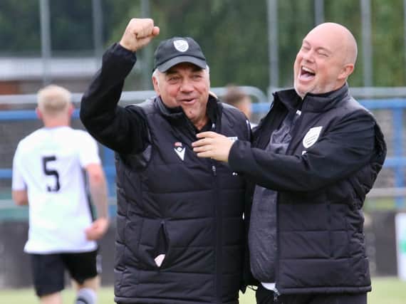 Bexhill manager Ryan Light (right) and assistant John Masters are happy after seeing their team win at Eastbourne Town / Picture: Joe Knight